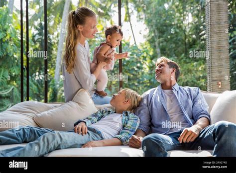 Happy family spending time together and enjoying at home Stock Photo ...