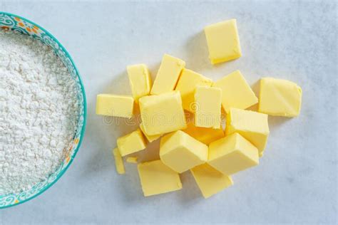 Cubes Cold Butter on All-purpose Flour with a Jar of Ice Water in ...