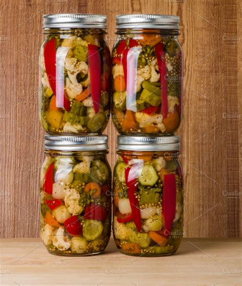 Jars of pickled vegetables ~ Food &amp; Drink Photos ~ Creative Market