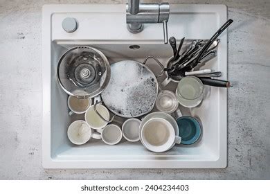 Kitchen Sink Full Dishes Photos, Images and Pictures