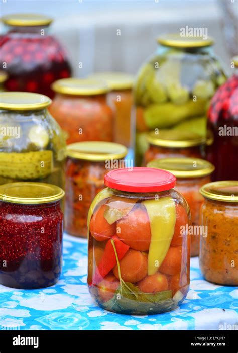 a Home canned vegetables in the garden in summer Stock Photo - Alamy