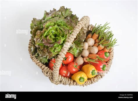 Basket of fresh vegetables Stock Photo - Alamy