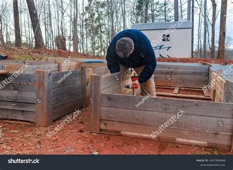 Building Raised Garden Bed Wooden Frame Stock Photo 2417563649 ...