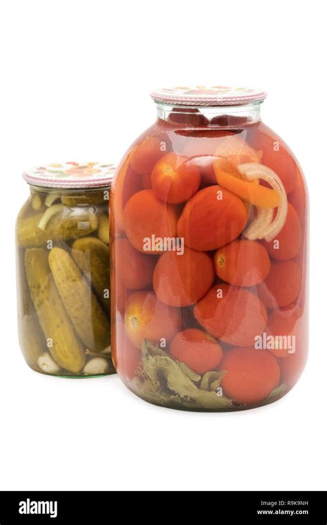 Jars of canned tomatoes and cucumbers Stock Photo - Alamy