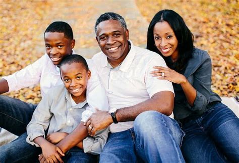 Download A happy Black family of five enjoying time together ...