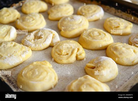 Sweet rolls of biscuit dough uncooked Stock Photo - Alamy