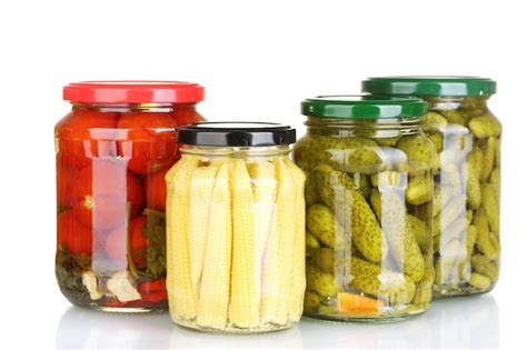Premium Photo | Jars of canned vegetables isolated on white