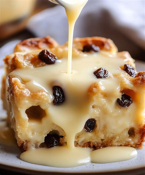 Creamy Bread Pudding with Raisins and Sweet Sauce: A Comforting Dessert ...