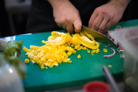 Chef hands cutting fresh and delicious vegetables 12079313 Stock Photo ...