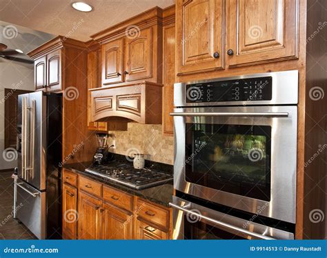 New Modern Kitchen Appliances Stock Image - Image of hall, floor: 9914513