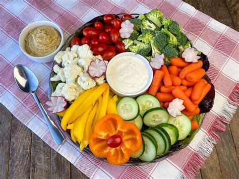 Homemade veggie tray idea with hummus and ranch as dips for assorted ...