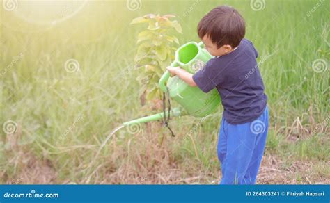 Child and watering can stock image. Image of people - 264303241