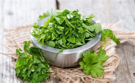 Premium Photo | Fresh cutted herbs parsley