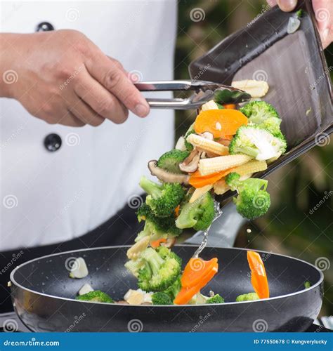Chef Putting Vegetable To Pan Stock Photo - Image of ingredient, corn ...