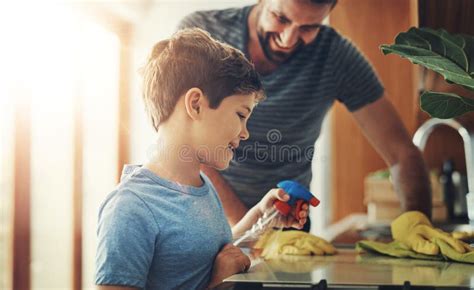 Child Development, Cleaning or Hygiene with Father and Son in Kitchen ...