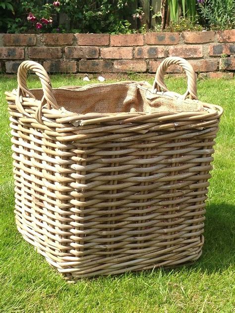 a large wicker basket sitting in the grass