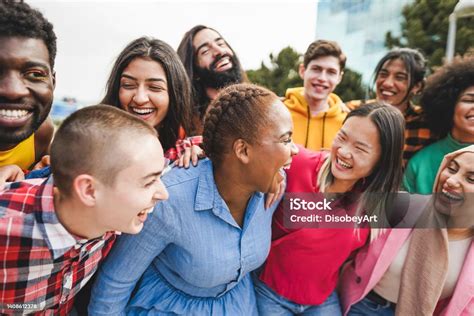 Young Diverse People Having Fun Outdoor Laughing Together Stock Photo ...