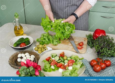 Preparing Vegetable Healthy Food: Lettuce Salad with Tomato and ...