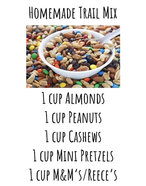 the ingredients for homemade trail mix in a white bowl on top of a pile ...