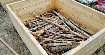 How To Fill a Raised Garden Bed with Soil Layers