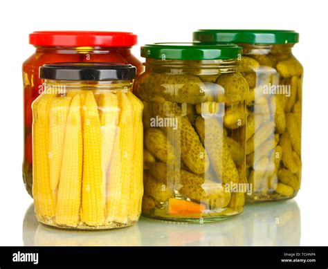 Jars of canned vegetables isolated on white Stock Photo - Alamy