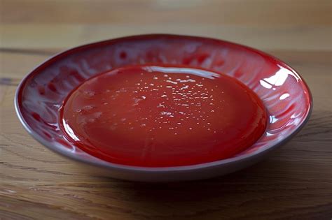 Premium Photo | Testing jam consistency on a chilled plate ar generative ai