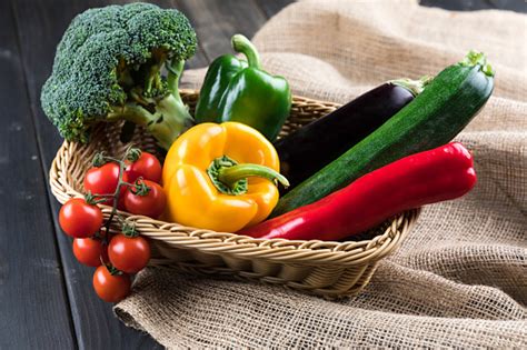 Closeup View Of Fresh Seasonal Vegetables In Basket On Sackcloth Stock ...