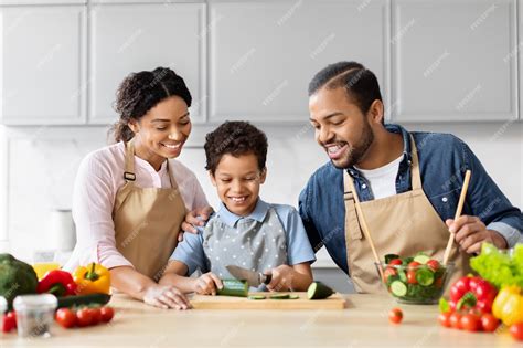 Premium Photo | African american family cooking together in kitchen