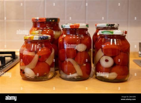 Canned tomatoes in glass jars Stock Photo - Alamy