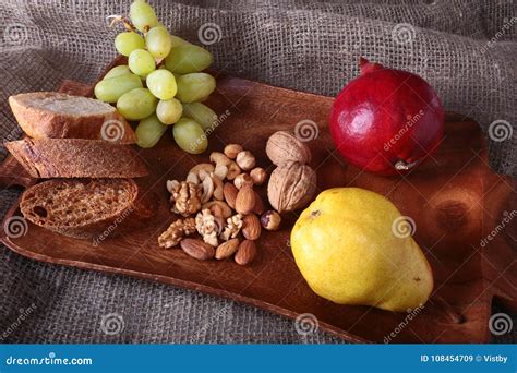 Fresh Organic Fruits on Wood Serving Tray. Assorted Apple, Pear, Grapes ...