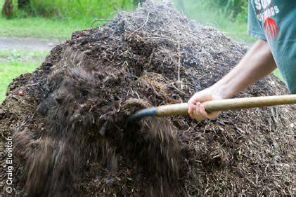 (left): Turning large compost pile for uniform composting and so that ...