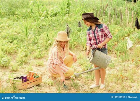 Sisters Together Helping at Farm. Girls Planting Plants. Agriculture ...