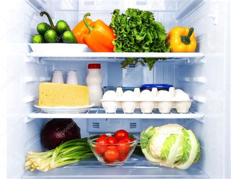 Refrigerator full of food — Stock Photo © belchonock #22010305